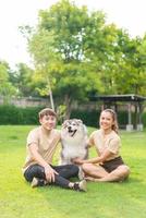 Asian couple love with dog photo