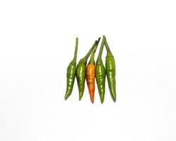 Red and Green hot Cayenne pepper Minimal food concept photo