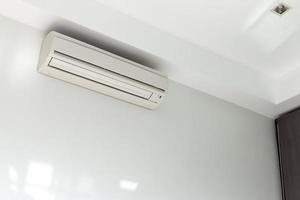 Wall mounted air conditioner in white house photo