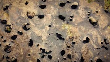 Top view of a naturally porous rock. photo