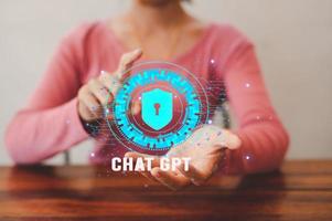 Businessman using chatbot in smartphone intelligence Ai.Chat GPT Chat with AI Artificial Intelligence, developed by OpenAI generate. Futuristic technology, robot in online system. photo