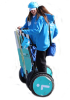 Two young beautiful girls in masks ride electric scooters in the Park on a warm autumn day. Walk in the Park. png