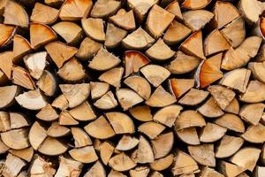 firewood stacked in the woodpile photo