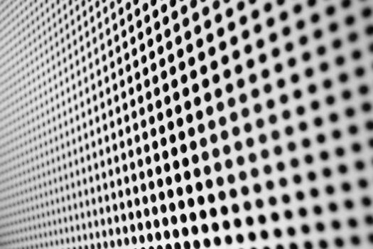 Metal Texture with Many Tiny Round Wholes photo