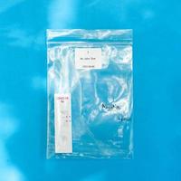 The Coronavirus test result in the zip bag on blue background. photo