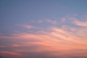 Pink and orange sky in twilight time for background. photo