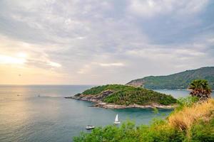 Phrom Thep Cape, the tropical sea in twilight and sunset period, scenic point of Phuket Island, The Pearl of the Andaman Sea,Thailand popular for tourist in the world. photo