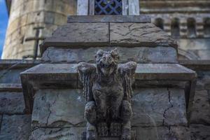 Antiquity in detail. Decoration of houses, balconies, windows, sculptures, walls. Elements of architectural design of buildings. Old plaster, Stone decorations. Elements of Gothic architecture photo