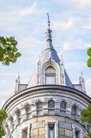 Antiquity in detail. Decoration of houses, balconies, windows, sculptures, walls. Elements of architectural design of buildings. Old plaster, Stone decorations. Elements of Gothic architecture photo