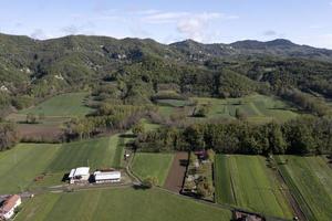 Borghetto di Borbera Pemonte Italy Village aerial View Panorama farmed fields photo