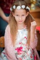 Portrait of adorable beautiful little girl indoors photo