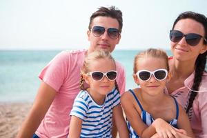Young beautiful family on vacation photo