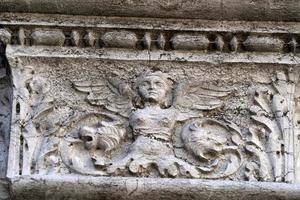 VENICE, ITALY - SEPTEMBER 15 2019 - doge ducal palace capital of column wayside sculpture detail photo