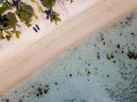 Canoe and kayaks in Polynesia Cook Island tropical paradise aerial view photo