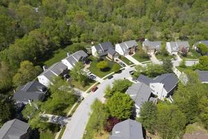 upper middle class american neighborhood with curving street in Maryland photo