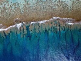 aerial view of waves on reef of polynesia Cook islands photo