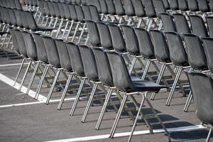 Many empty chairs without audience photo