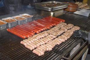 Cevapcici sausage on grill photo