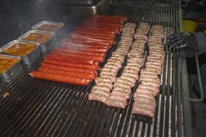 Cevapcici sausage on grill photo