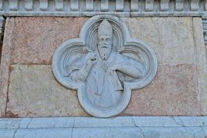 bologna piazza maggiore church san petronio bas relief photo
