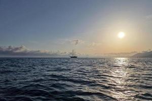 old vessel silhouette at sunset photo