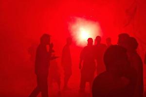 red smoke black people silhouette protest demonstration photo