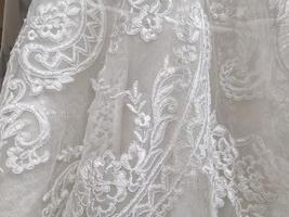 bride white dress lace detail photo