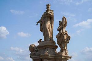 Prague charles bridge detail of statue photo