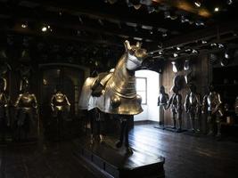 many medieval iron metal horse armor photo