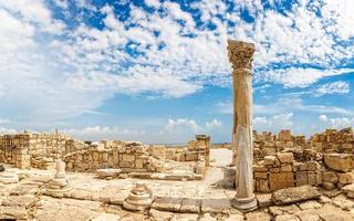 Columns and ruins of ancient Kourion with clouds and blue sky, Episcopi, Cyprus