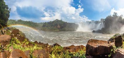 Iguazy Falls panorama with waterfalls cascades steam and rainbow, Argentine side photo