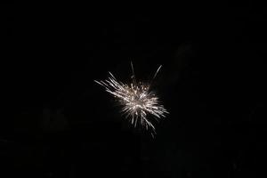 Colorful fireworks on the black sky photo