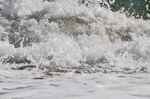 sea foam. splash water photo