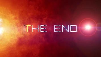 The End goldent text with orange red smoke cloud video