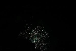 Colorful fireworks on the black sky photo