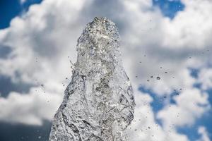 fountain splashing water texture in the sky photo