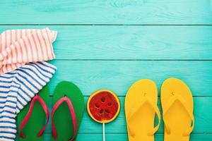 summer bavkground top view close up, summer accesories on wooden background photo