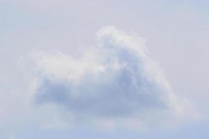 Clear blue sky and white clouds photo