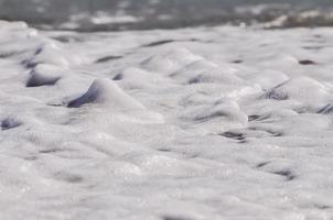 sea foam. splash water photo