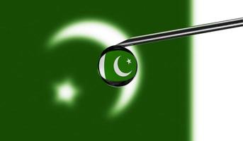 Vaccine syringe with drop on needle against national flag of Pakistan background. Medical concept vaccination. Coronavirus Sars-Cov-2 pandemic protection. National safety idea. photo