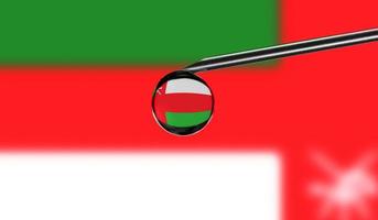 Vaccine syringe with drop on needle against national flag of Oman background. Medical concept vaccination. Coronavirus Sars-Cov-2 pandemic protection. National safety idea. photo