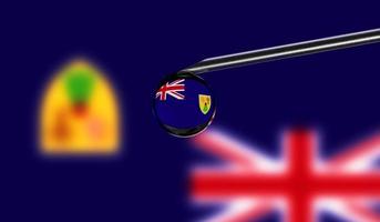 Vaccine syringe with drop on needle against national flag of Turks and Caicos Islands background. Medical concept vaccination. Coronavirus Sars-Cov-2 pandemic protection. National safety idea. photo