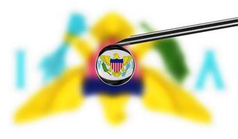 Vaccine syringe with drop on needle against national flag of Virgin Islands US background. Medical concept vaccination. Coronavirus Sars-Cov-2 pandemic protection. National safety idea. photo
