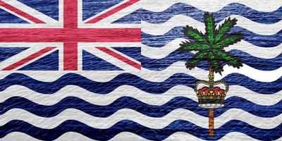 Flag of the British Overseas Territory of British Indian Ocean Territory on a textured background. Concept collage. photo