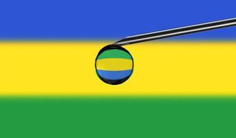 Vaccine syringe with drop on needle against national flag of Gabon background. Medical concept vaccination. Coronavirus Sars-Cov-2 pandemic protection. National safety idea. photo