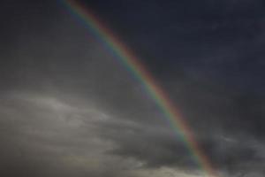 rainbow after a summer thunderstorm photo