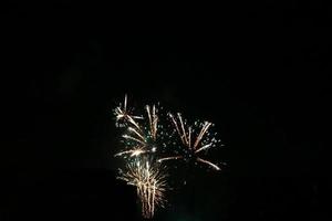 Colorful fireworks on the black sky photo