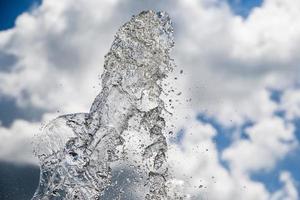 fountain splashing water texture in the sky photo