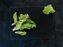 Green lettuce leaves photo