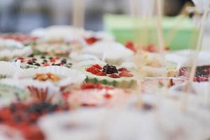 tasty vegan sweets arranged on the table for wedding reception photo